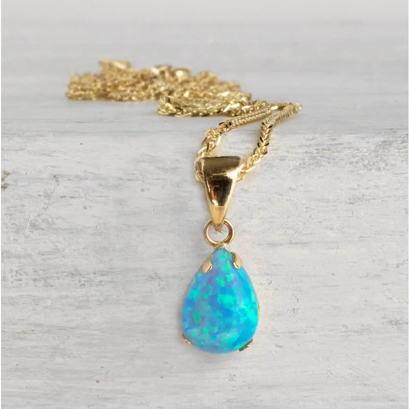 14K Yellow Gold Teardrop Blue Opal 7X10mm Pendant