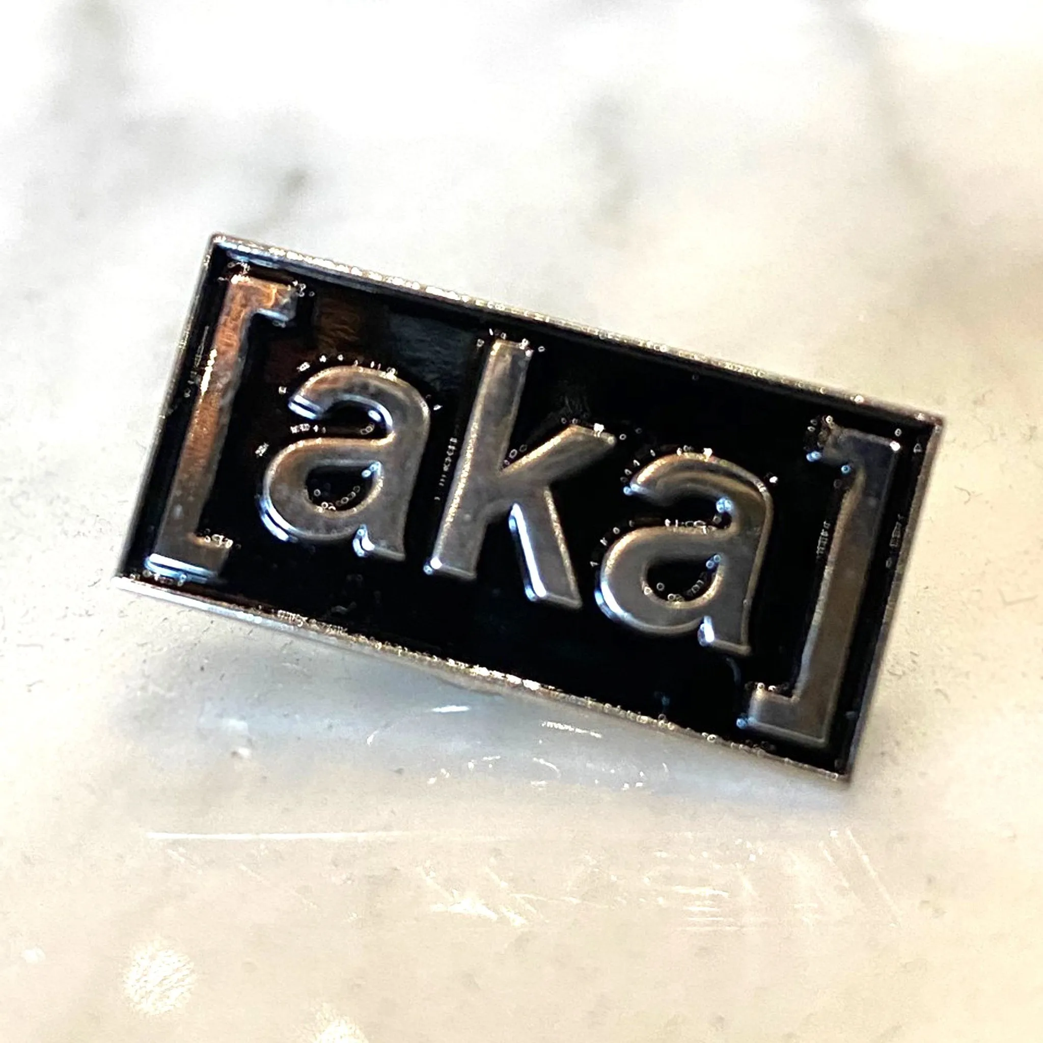 aka enamel pin