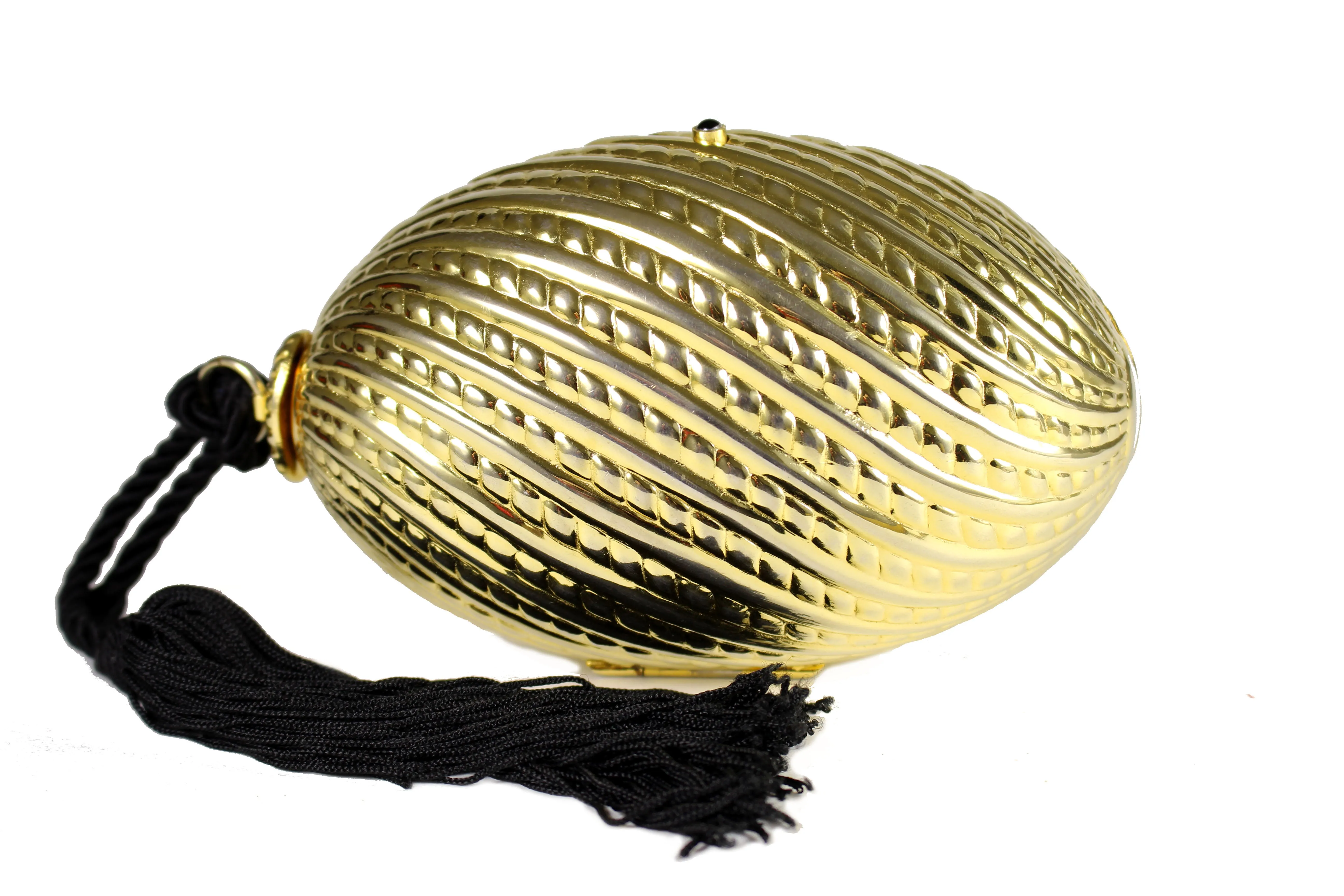 Golden egg clutch with wrist tassel